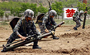 Officers and men in live-ammunition drill