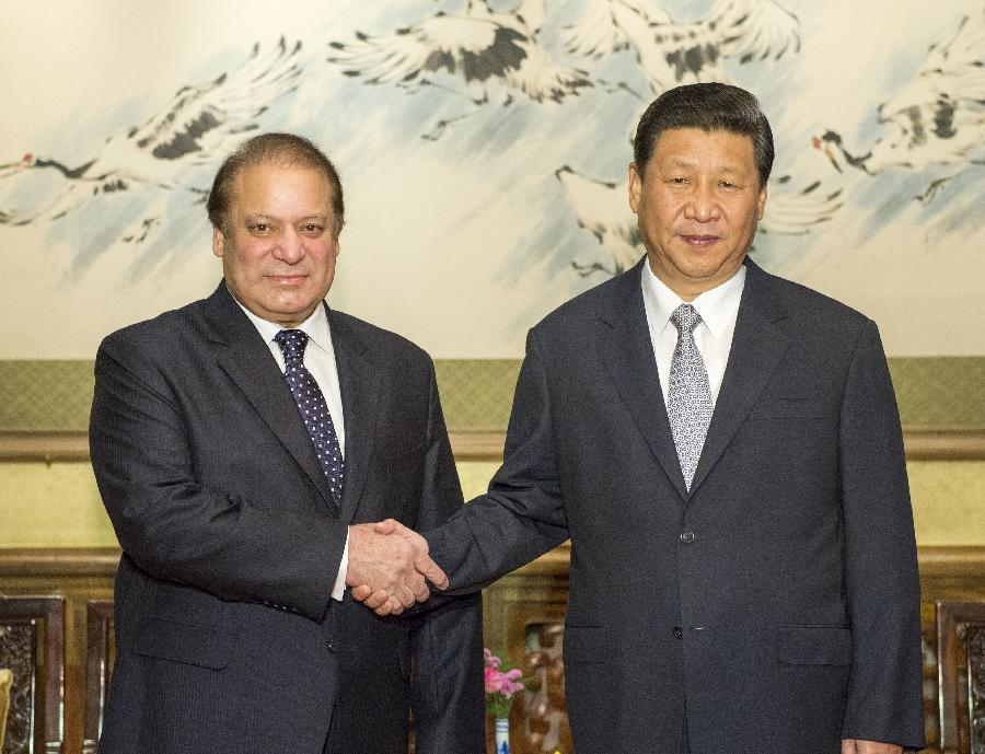 Chinese President Xi Jinping (R) meets with Pakistani Prime Minister Nawaz Sharif, in Beijing, capital of China, July 4, 2013. (Xinhua/Li Xueren)