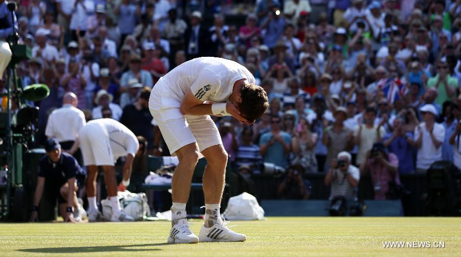 Andy Murray of Britain celebrates after winning the men's singles final match with Novak Djokovic of Serbia on day 13 of the Wimbledon Lawn Tennis Championships at the All England Lawn Tennis and Croquet Club in London, Britain, July 7, 2013. Andy Murray won his first Wimbledon title and ended Britain's 77-year wait for a men's champion with a 6-4 7-5 6-4 victory over world number one Novak Djokovic. (Xinhua/Wang Lili)