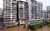 Rainstorms lead to flood of Qujiang River in SW China