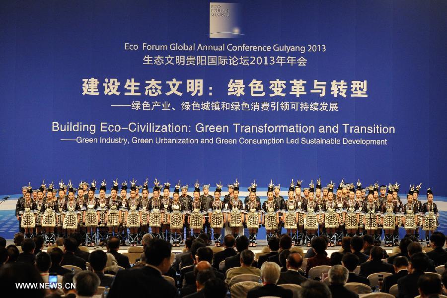 Performers of Dong ethnic group sing at the opening ceremony of the Eco Forum Global Annual Conference Guiyang 2013 in Guiyang, capital of southwest China's Guizhou Province, July 20, 2013. Over 2,000 participants from home and abroad attended the conference themed on "Building Eco-Civilization: Green Transformation and Transition". (Xinhua/Ou Dongqu) 