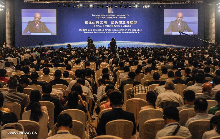 The opening ceremony of the Eco Forum Global Annual Conference Guiyang 2013 is held in Guiyang, capital of southwest China's Guizhou Province, July 20, 2013. Over 2,000 participants from home and abroad attended the conference themed on "Building Eco-Civilization: Green Transformation and Transition". (Xinhua/Ou Dongqu) 