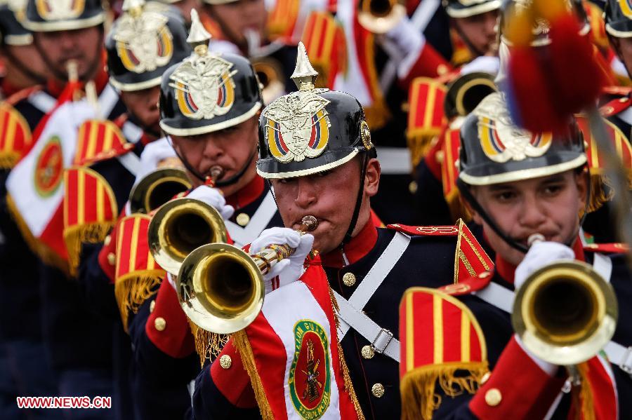 Elements of Colombia's Military Forces participate in the military parade in the framework of the Colombia's Independence Day commemoration, in Bogota, Colombia, on July 20, 2013. The commemoration of the 203rd anniversary of Colombia's Independence includes a homage to the Colombian Army veterans. (Xinhua/Jhon Paz) 