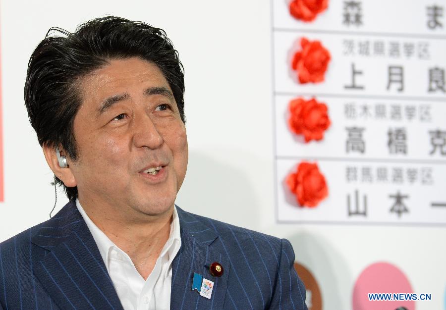 Japanese Prime Minister and President of the Liberal Democratic Party (LDP), Shinzo Abe delivers a speech at the party's headquarters in Tokyo, capital of Japan, July 21, 2013. Japan's ruling camp, the Liberal Democratic Party (LDP) and the New Komeito Party, has put an end to the country's "twisted Diet" as it won a majority of seats in the House of Councillors, according to Japan's broadcaster NHK.(Xinhua/Ma Ping)