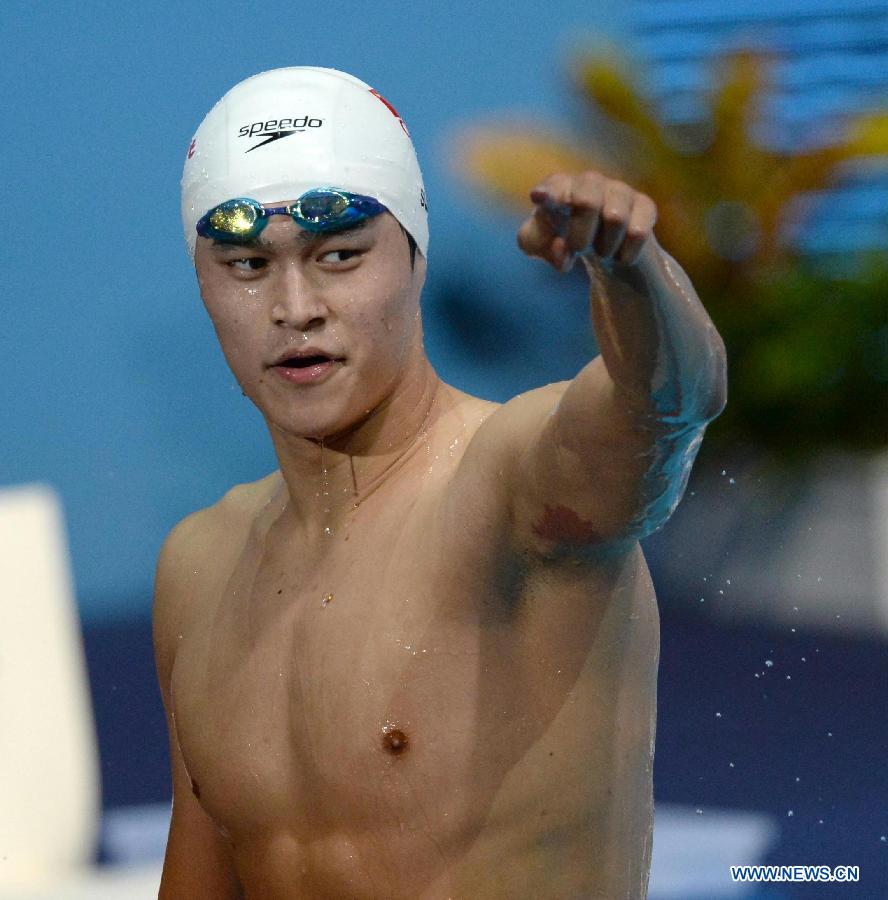 Sun Yang of China reacts after winning the men's 800m freestyle final of the swimming competition at the 15th FINA World Championships in Barcelona, Spain on July 31, 2013. Sun Yang won the gold medal with 7 minutes and 41.36 seconds. (Xinhua/Guo Yong)