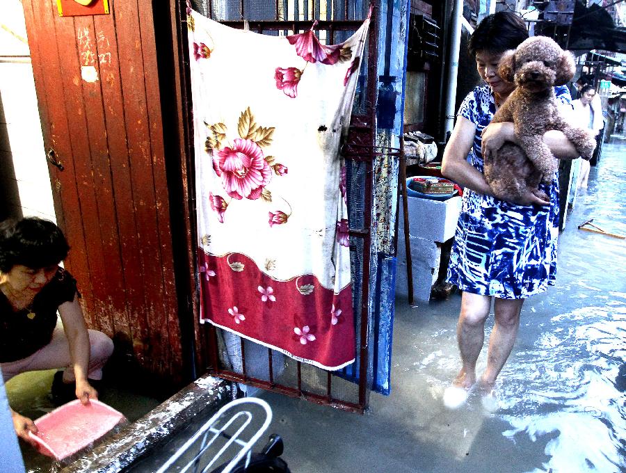 Old urban areas in Shanghai flooded by downpours