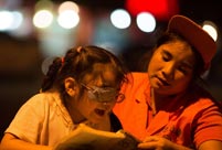 Maternal love under streetlight