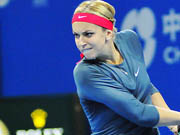 Li Na edges Lisicki to reach China Open quarterfinals 