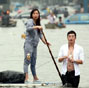 Local people fight against waterlog with homemade boats 