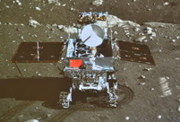 China's moon rover, lander photograph each other