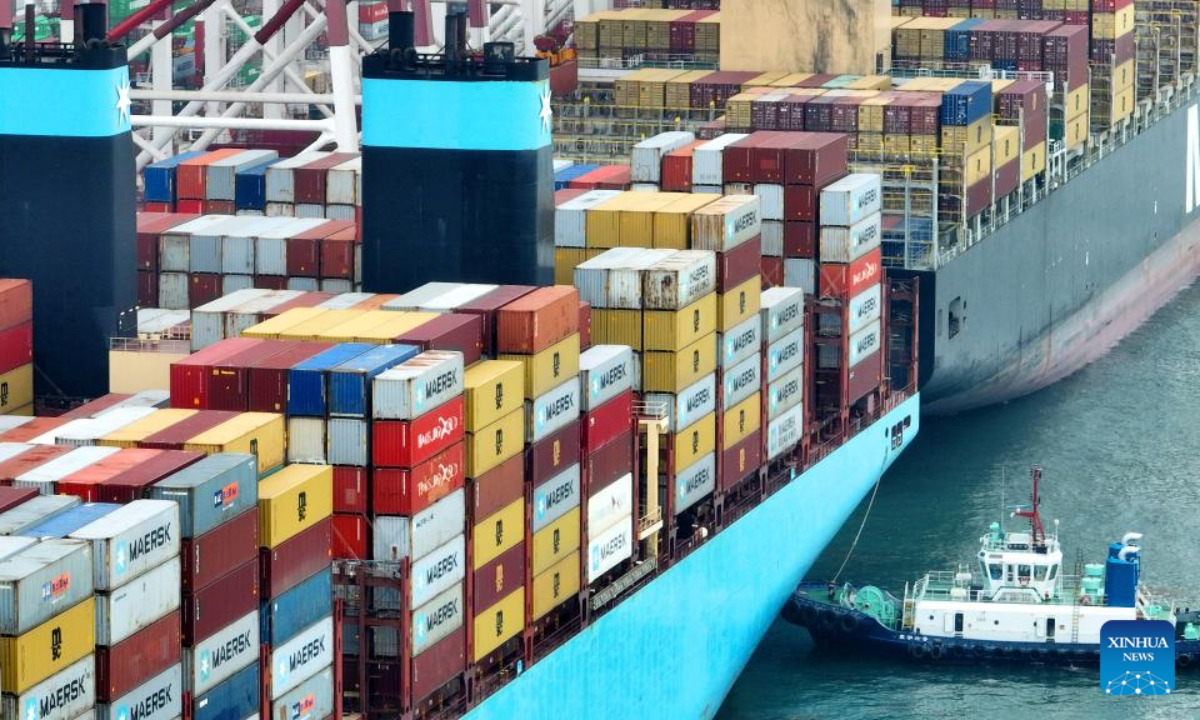 Aerial photo taken on July 29, 2022 shows container ships at the Qianwan Container Terminal in Qingdao Port, east China's Shandong Province. Photo:Xinhua