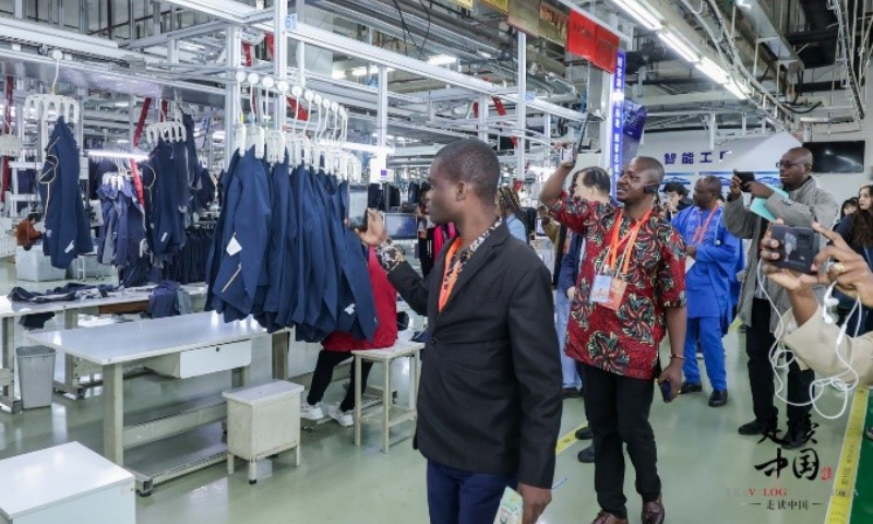 Foreign journalists visit the intelligent production lines at Hodo Group China in Wuxi, East China's Jiangsu Province on March 20, 2024. Photo: huanqiu.com