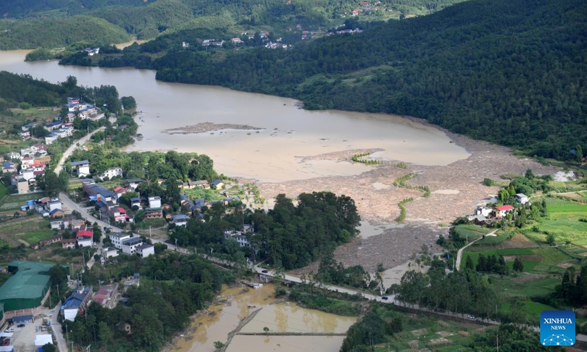 This photo taken from a helicopter on July 29, 2024 shows parts of the disaster-stricken areas in Zixing, central China's Hunan Province. A number of helicopters on Monday were sent to dispatch drinking water, rice, vegetables, medicine and other daily necessities into some disaster-stricken areas in Zixing City, and successively relocated people stranded in the waterlogged residences. (Photo: Xinhua)