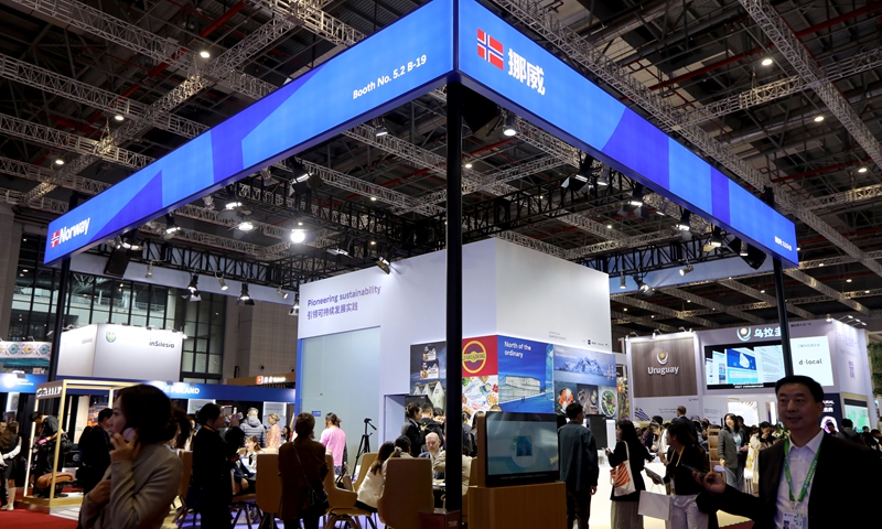 Visitors browse the national pavilion of Norway at the 7th China International Import Expo in Shanghai on November 6, 2024. Photo: Chen Xia/GT